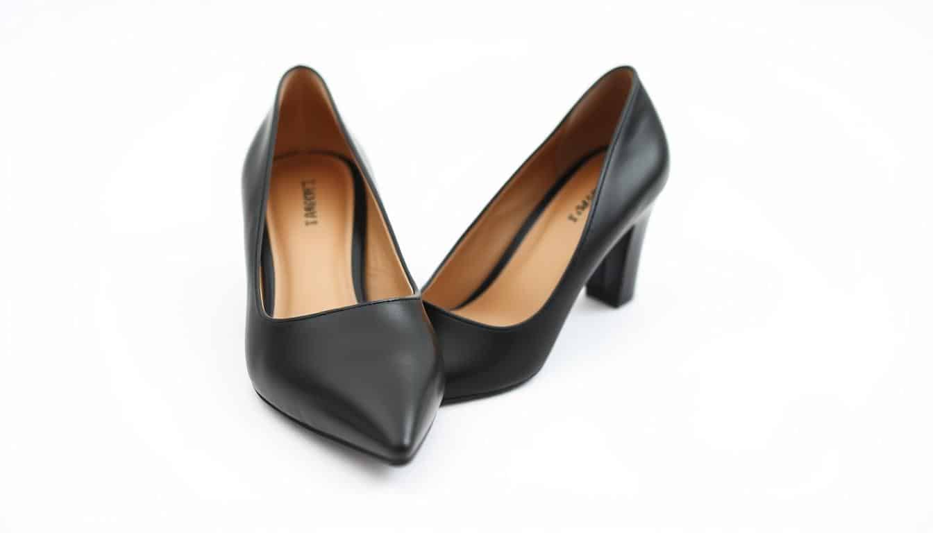 Elegant black leather pumps with a sleek, minimal design and a subtle, high-quality sheen. The shoes are positioned on a simple, clean white background, allowing them to be the sole focus of the image. The lighting is soft and diffused, creating a sense of refinement and sophistication. The camera angle is slightly elevated, giving the viewer a close-up, detailed view of the shoes. The overall mood is one of understated luxury and timeless style, reflecting the idea of investing in quality over quantity when it comes to essential wardrobe pieces. Elegant black leather pumps with a sleek, minimal design and a subtle, high-quality sheen. The shoes are positioned on a simple, clean white background, allowing them to be the sole focus of the image. The lighting is soft and diffused, creating a sense of refinement and sophistication. The camera angle is slightly elevated, giving the viewer a close-up, detailed view of the shoes. The overall mood is one of understated luxury and timeless style, reflecting the idea of investing in quality over quantity when it comes to essential wardrobe pieces.